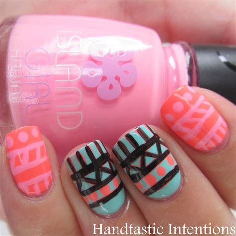 Some of the nails are painted in a green. Handtastic Intentions: Nail Art: Neon Tribal Print