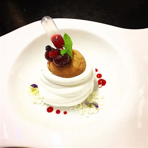 This is what happens when i have a serious craving for peanut butter and have too much dark chocolate in my kitchen cabinets. Spyros Asimis on Instagram: "pavlova/ meringue nest ...