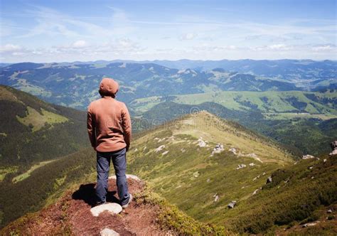 Man Standing On The Top Of The Mountain Stock Photo Image Of Alpine