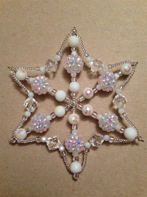 #jenfiledesperlesetjassume #miyuki #brickstitch #peyote #. Bead snowflake ornament | Christmas snowflakes ornaments ...