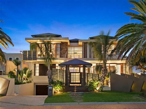Contemporary Waterfront Island Home With A Tropical Resort Style Design