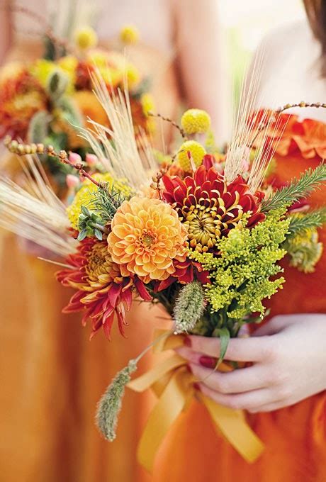 A bright fall wedding bouquet with red, burgundy and blush flowers plus greenery. { Ask Cynthia }: Wedding Inspirations | Wheat Bouquets