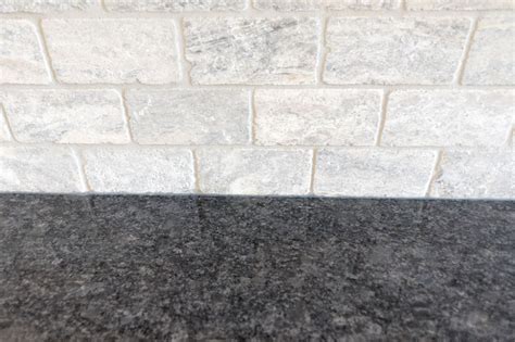 Highly recommended for interior and exterior projects, this stone looks amazing when it is finished and processed by stone. Silver Travertine brickset and polished steel-grey granite ...