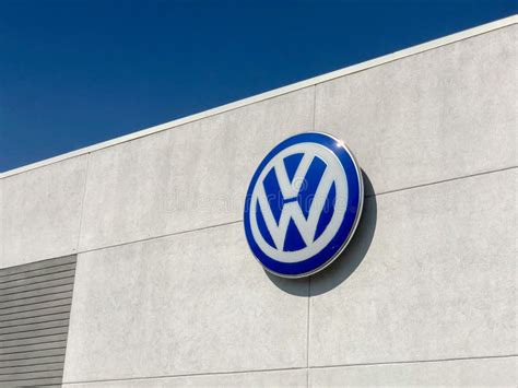 Volkswagen Car Maker Logo On A Building Of Dealership In San Diego