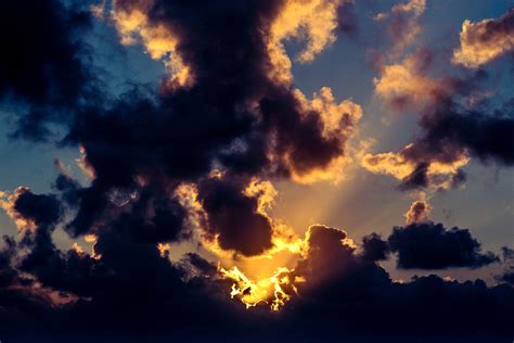 Dark Clouds And Sunrise Sky With Sun And Rays Hoodoo Wallpaper
