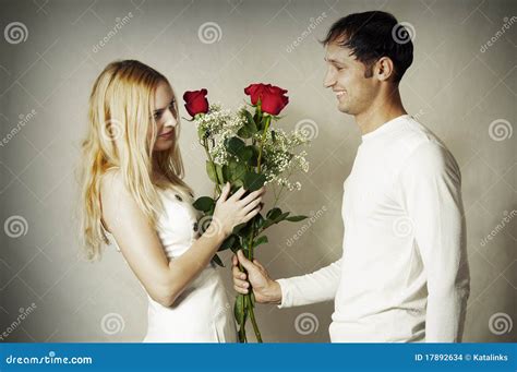 Young Loving Couple With Flowers Stock Photo Image Of Lady Lifestyle