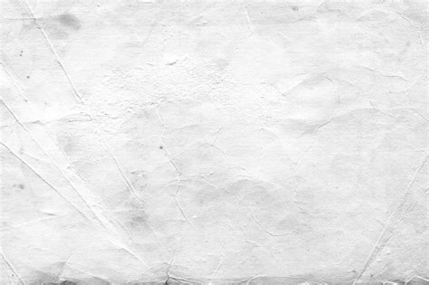 Premium Photo White Vintage And Old Looking Paper Background With A Grunge Texture