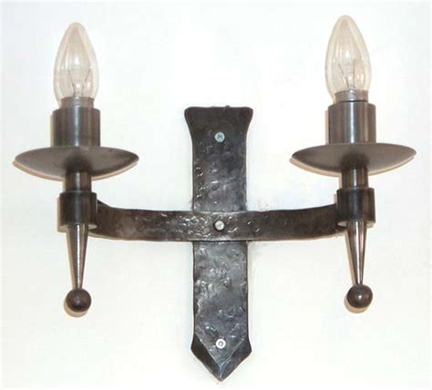 I'm sorry but this is only a discussion. Forge Tenterden Kent Medieval style double wall light with battered natural finish
