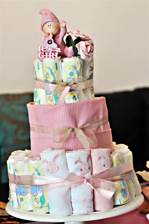 A diaper cake is an essential part of every baby shower! diaper cake DIY | Baby nursery design, Baby shower diy ...