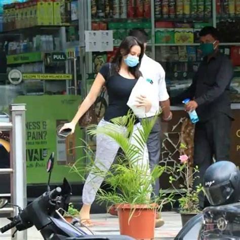 dilbar girl nora fatehi gets snapped outside a medical store and seemed in no mood to pose for