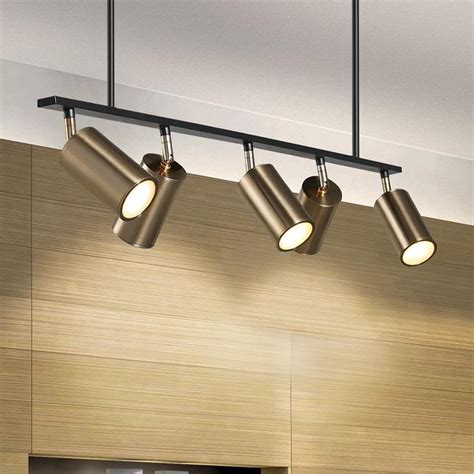 Ceiling track light adame with led lighting and metal structure available in two finishes. Modern Brass Hanging Track Lights | Modern track lighting ...