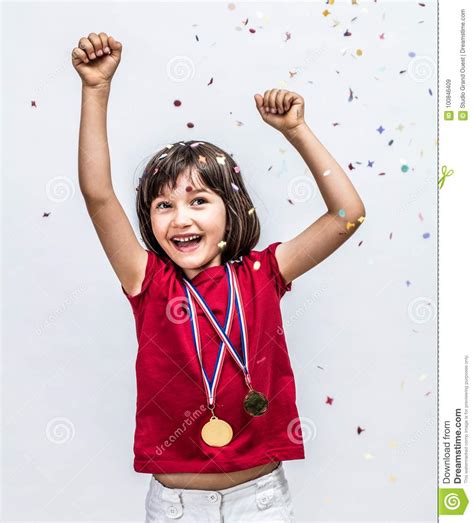Successful Beautiful Child Laughing With Champion Medals Celebrating