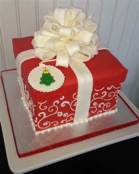 Maybe you would like to learn more about one of these? Scrolled Christmas Gift Box Cake - CakeCentral.com