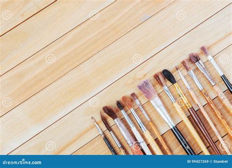 Bunch Of Old Artist Paintbrushes On Wooden Rustic Table Stock Image