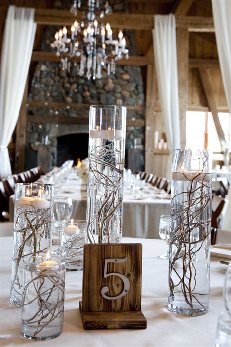 Floating Candle And Willow Branch Centerpieces Reception