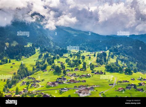 Beautiful View Of Idyllic Mountain Scenery In The Alps With Old Chalets