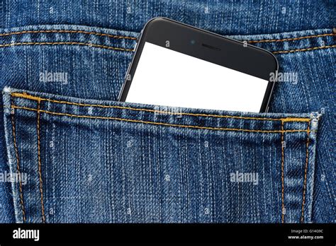 The Smartphone In Jeans Close Up Stock Photo Alamy