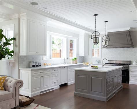 To offset the depth of the dark cabinets and equally dark grey counters, the island has been comprised of white and light shades. Grey Island | Houzz