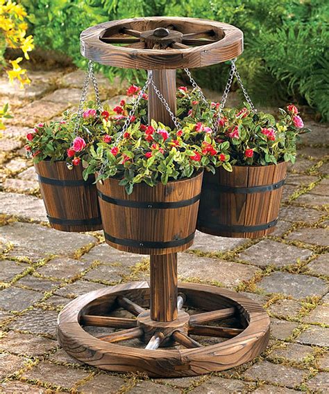 This cascading planter allows you to do just that. Wooden Wheel Planter by Zingz & Thingz #zulily # ...