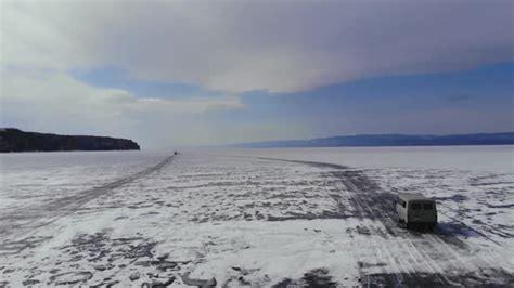 Car Driving On Ice Road Of Lake Baikal By Linnikovm Videohive