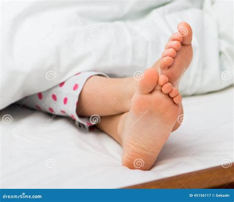 Baby Bare Feet On The Bed Stock Photo Image 45156117