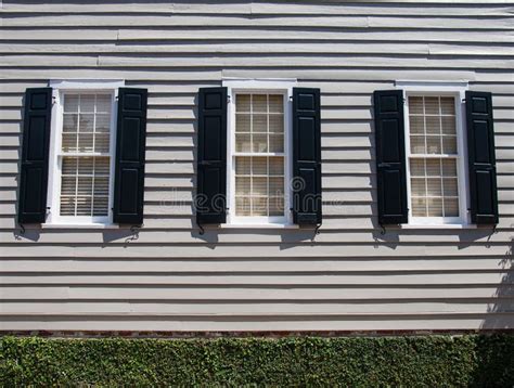 Three Windows With Black Shutters Stock Photo Image Of Window