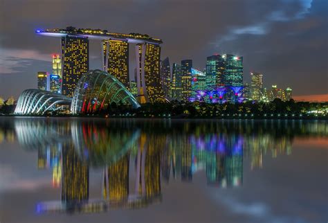 Singapore City Of Reflection Marina Bay Bathed In A Colourful Photo
