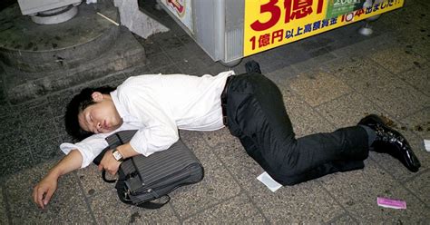 Photographer Documents The Common Phenomenon Of Drunk Japanese Businessmen Snoozing In Public