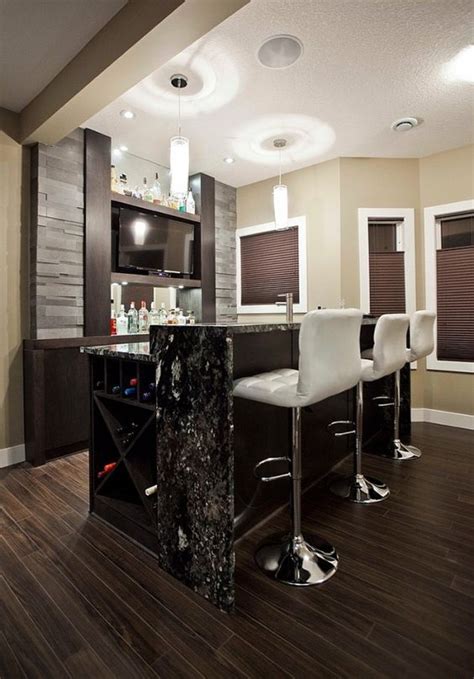 You may be able to see stains from this that red carpet above the white basement floor paint seems to be the effort to define a seating area for this modern office. 27 Stylish Basement Bar Décor Ideas - DigsDigs