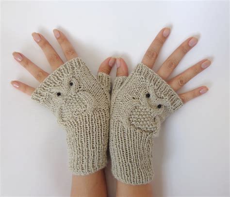 Fingerless mittens are becoming quite popular this time of year. Owl Fingerless Gloves -Knitted Mittens Or Mitts In Cream