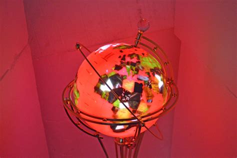 Illuminated Red Gold World Globe Rotated By Motor Size 19l X 19w
