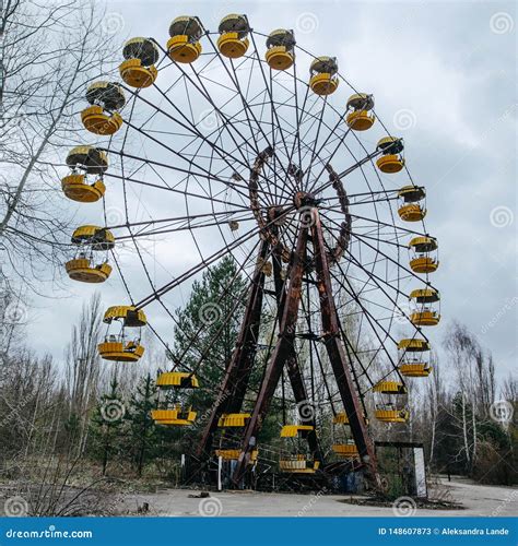 Abandoned Carousel And Abandoned Ferris At An Amusement Park In The