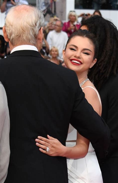 Because she has an upcoming movie named the dead don't die. Selena Gomez and Bill Murray Flirt Cannes Film Festival Photos