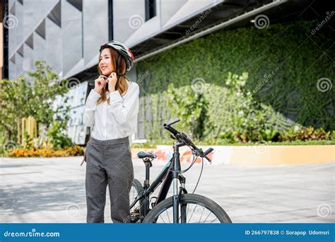 Businesswoman Putting Biking Helmet Prepared Cyclists Go To Work Stock