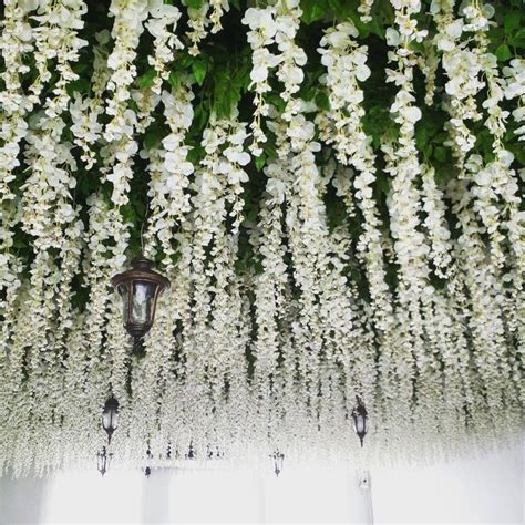 Party joy 5 pcs 41ft flower garland fake rose vine artificial flowers hanging rose ivy hanging baskets wedding arch garden background decor 4.6 out of 5 stars 1,421 $11.99 $ 11. Fake flowers hang on the ceiling : Garden Moment Coffee ...