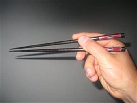 Forks are only used to help guide food onto the spoon. How to Eat with Chopsticks