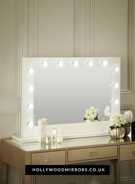 I bought this for my dressing table as it is in the darkest corner of the room (possibly house) and no amount of natural light or switching the bedroom light on makes it any better. Audrey Hollywood Mirror in White Gloss 100 x 80cm
