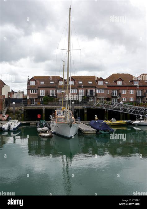 Boats And Houses At Camber Wharf Old Portsmouth Hampshire Stock Photo