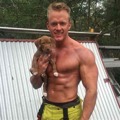Nothing To See Here Just Hot Firemen Holding Tiny Puppies For Charity