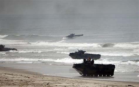 Amphibious Assault Vehicles Storm Red Beach During Exercises At Camp