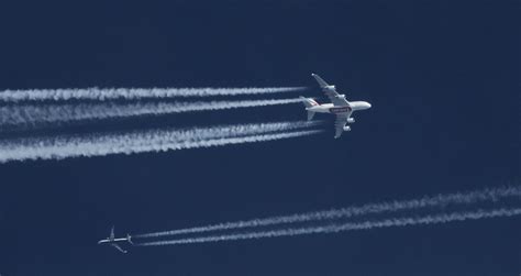 We want to imagine in terms of service, fit out and how it will compare to their current operations. Emirates A380 A6-EDT contrail past a Ryanair 737 | Here's ...