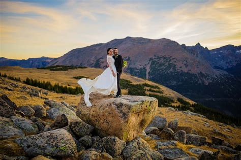 A Wedding Couple Watch The Sun Set On Ute Trail In Rmnp Estes Park