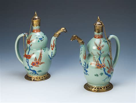 A Pair Of Celadon Glazed Double Gourd Ewers Japanese Circa 16601680
