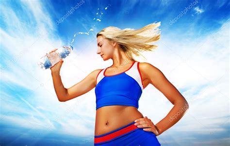 Young Woman Drinking Water After Fitness Exercise — Stock