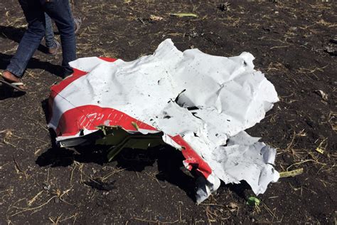 Investigators At Ethiopian Airlines Crash Site Look For Answers Gallery Al Jazeera