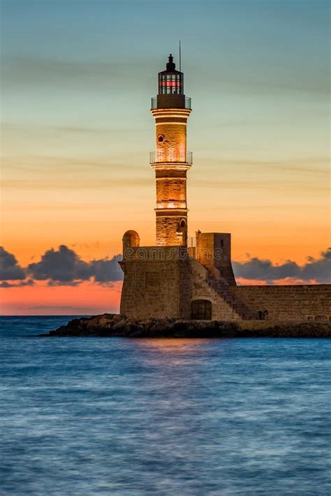 Ancient Venetian Lighthouse Guarding The Old Port Of Chania Greece At