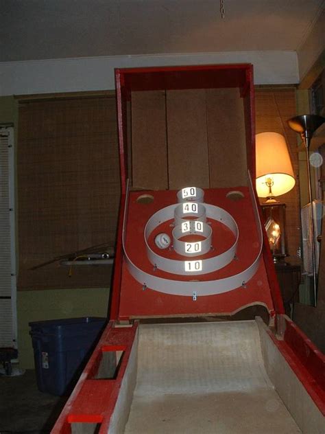The simple experience of rolling a ball into a target is so freakishly satisfying that i used to play as much as i could as a kid at the local. DIY Skeeball