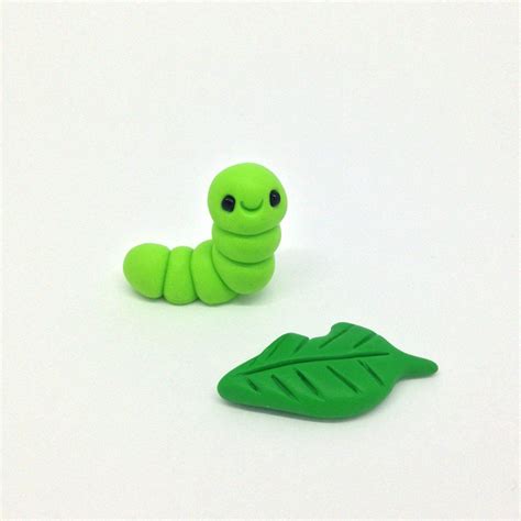 About predation rates on caterpillars that differ in appearance or behavior where they are more visible. Polymer Clay Green Caterpillar & Leaf Figurine, Cute ...