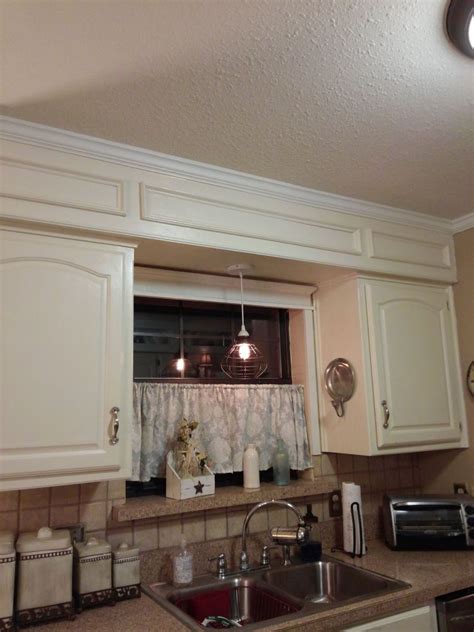 See more ideas about above kitchen cabinets, above cabinets, decorating. A homeowner wanted to update her kitchen. First she knocks ...