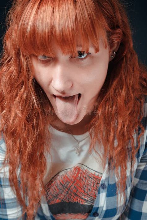 Red Haired Girl Shows Tongue Stock Photo Image Of Background Glamour